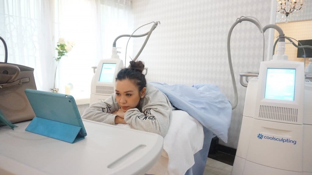 Woman undergoing coolsculpting